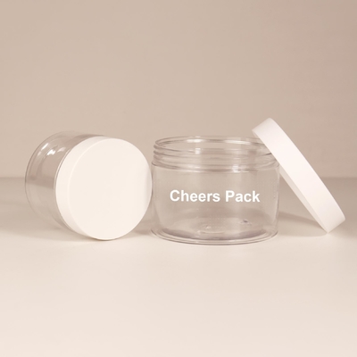 Großhandel Hautpflege Leerkörper-Scrub PET-Glasbehälter klares rundes Kunststoff-Körper-Scrub-Glas mit Deckel